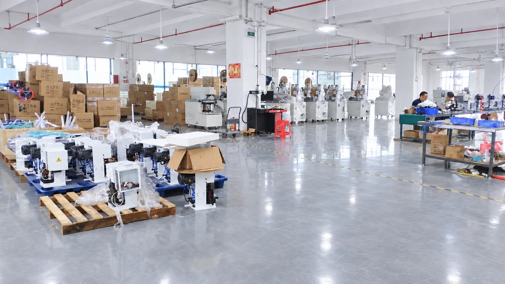 Wire-processing equipment and assembly workstations inside our Dongguan workshop