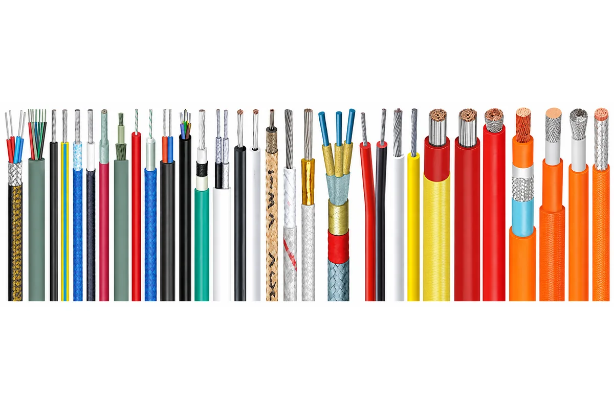 Stripped wire and cable samples showing conductors, insulation and shielding on a white background
