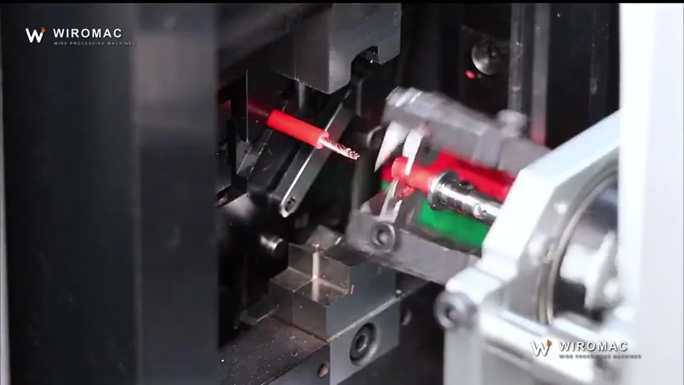 Chain-fed terminals stripped and crimped on a bench press with a green ready light.