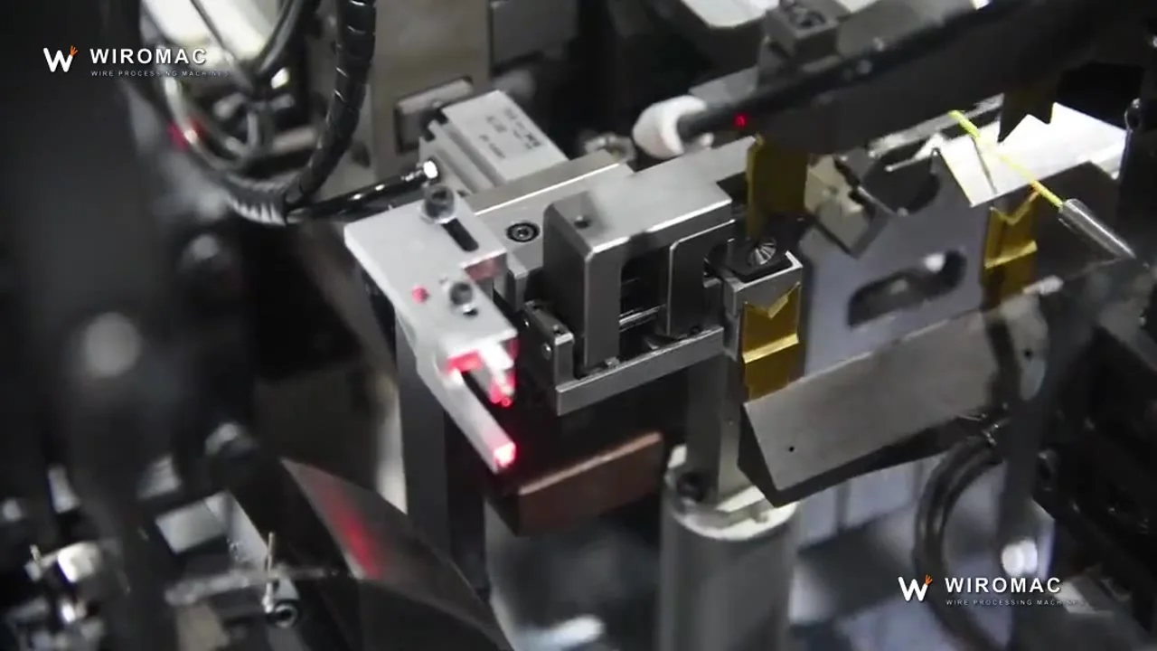 Double-end waterproof seal and crimp — red and yellow leads collected on the belt.