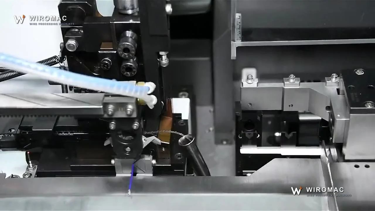 AWG 20–32 electronic wire processed both ends — blue leads into the collection tray.