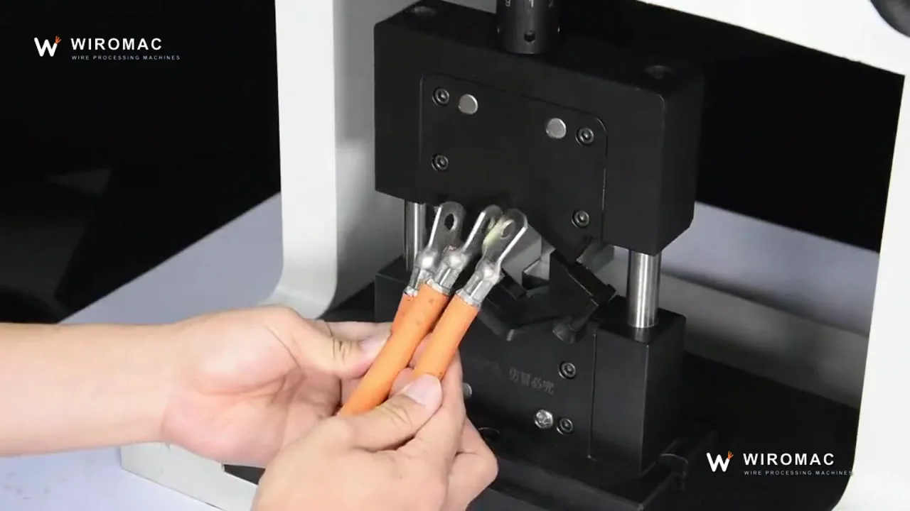 Cable lug crimped hand-fed in a bench hydraulic head.