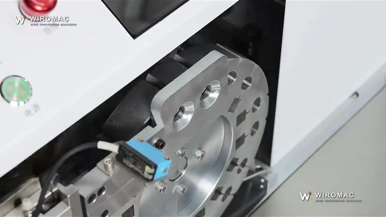 Heat-shrink sleeve slid onto a large black cable end and shrunk on a bench station.