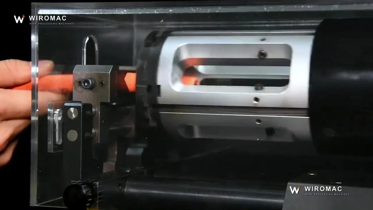 Rotary head scores a coax jacket as a ring and pulls it clean — no flat spot, braid intact.