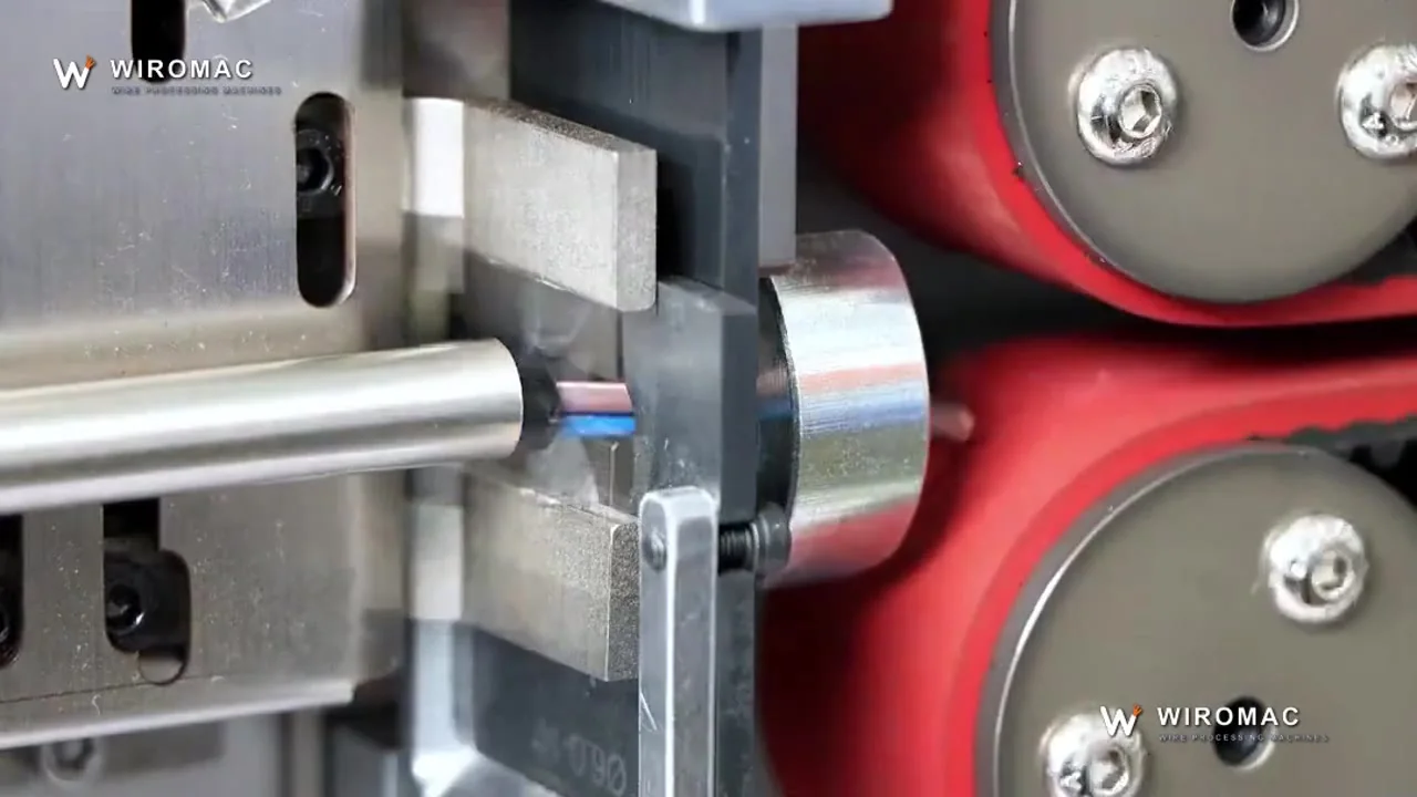 OD 12 mm sheathed cable cut and stripped on a belt-fed bench machine.