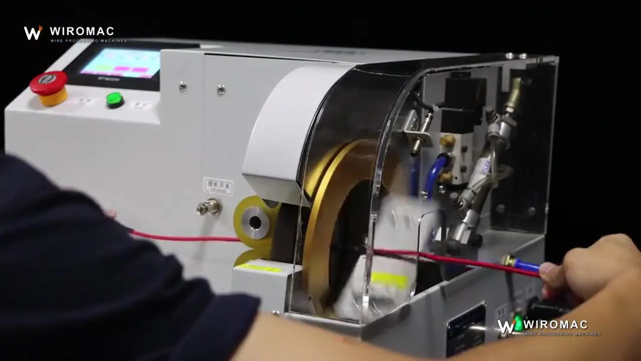 Spot band on a hand-held bundle at a bench taping head.