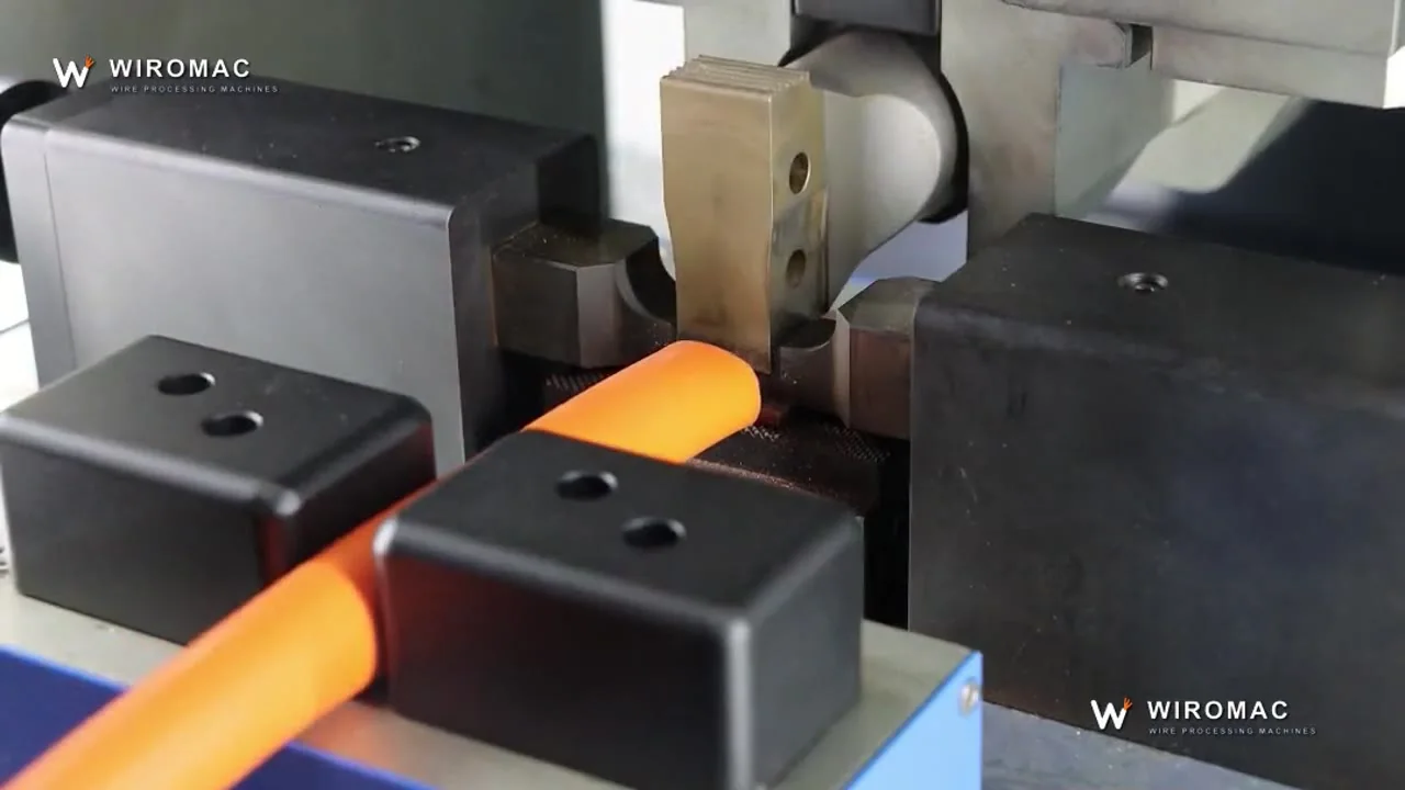 Large orange cable ultrasonically welded — the fused end shown in hand.
