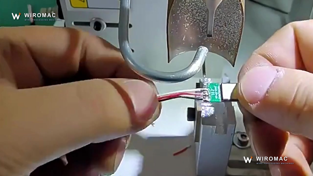 Semi-Automatic Iron Soldering Machine with Automatic Solder Feed WM-722 running